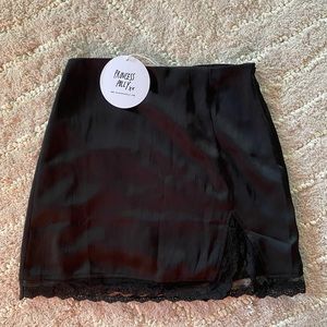 Princess polly black mini skirt with lace detailing and slit at the bottom